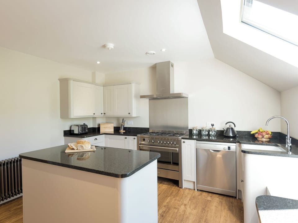 Well-equipped kitchen with island | Property 1 - Rew Farm Barns, Ventnor