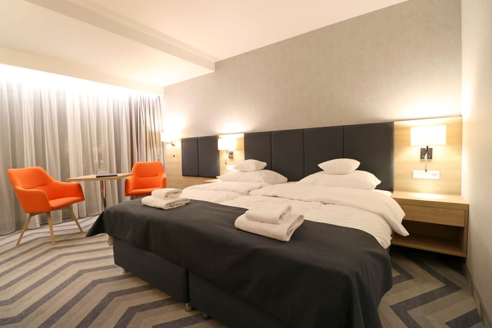 In-room safe, desk, soundproofing, cribs (surcharge)