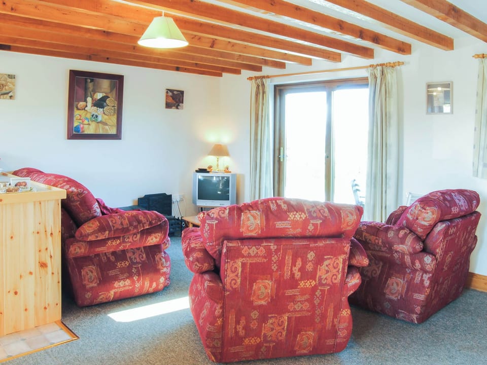Beamed open plan living area | Porth View - Higher Lanvean Farm, St Mawgan, near Newquay