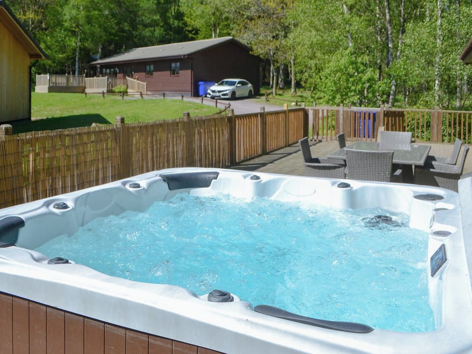 Relaxing private hot tub | Leafy Run - Otterburn Hall Lodges, Otterburn, near Bellingham