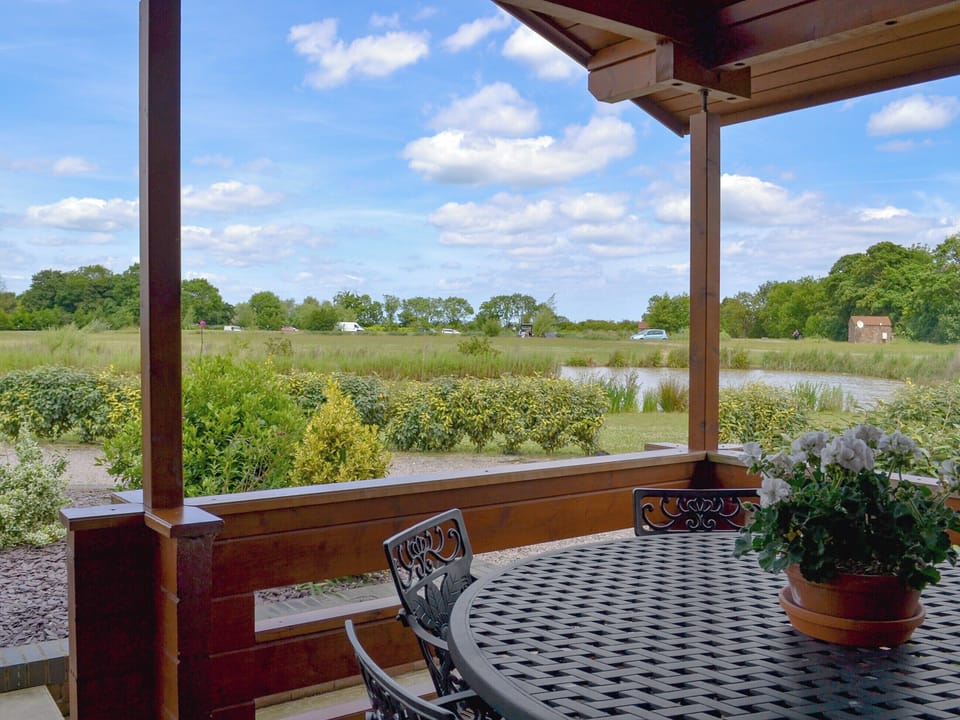 Sitting out area with lovely views | Willow Lodge - Faulkers Lakes, Burgh le Marsh, near Skegness