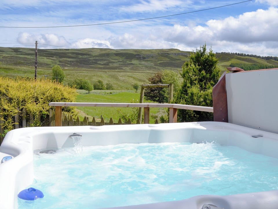 Relaxing hot tub with countryside views | Dalvanie Mill, Folda, Glenisla