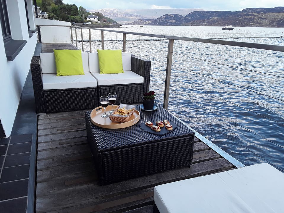 Decked balcony overlooking the Kyles of Bute | Waterside, Tighnabruaich