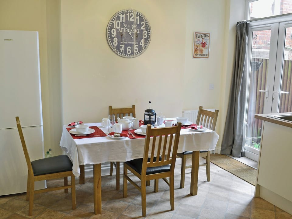 Dining area leading to patio doors | Samphire, Cromer