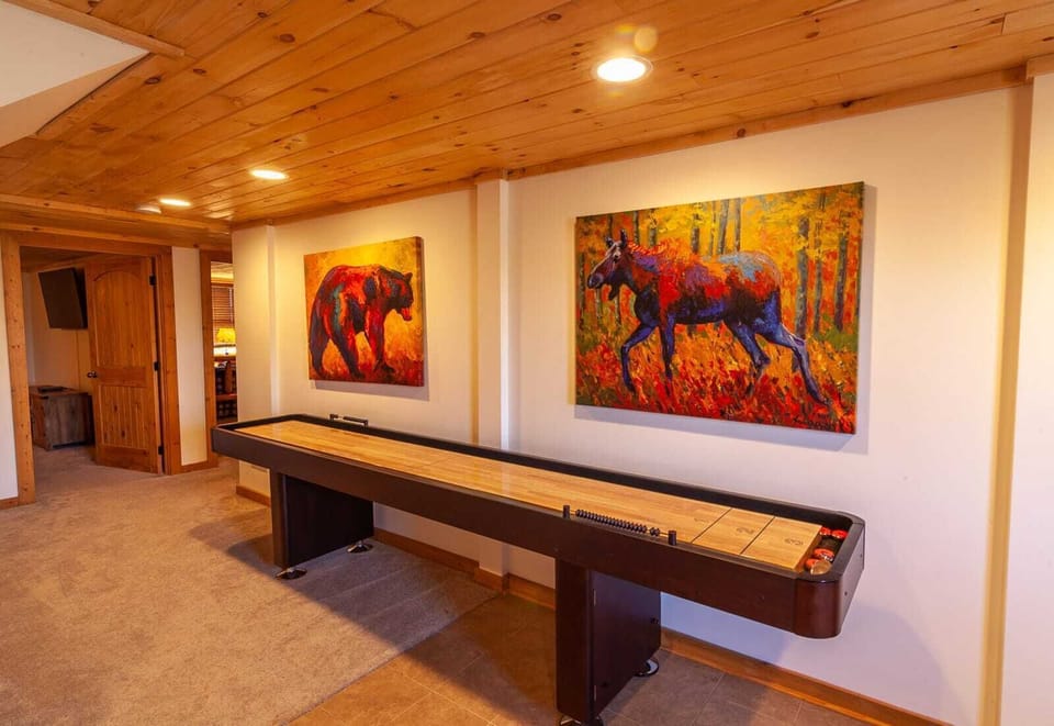Shuffleboard Table on Lower Level, also not pictured is a Ping Pong Table in the Attached Garage!