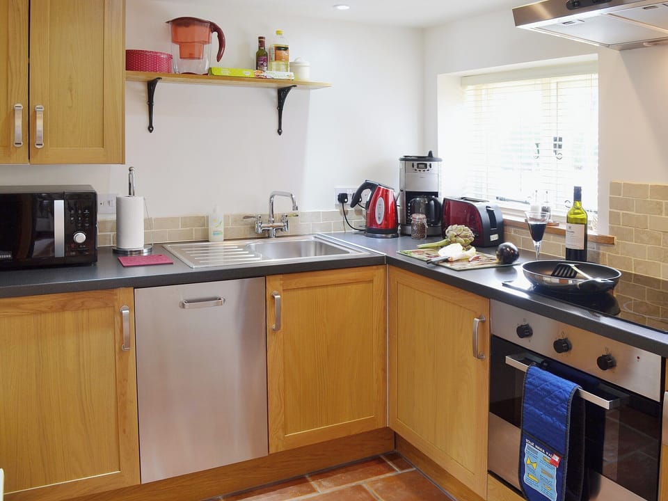 The modern kitchen with beautiful brushed steel appliances | The Stables - Canterbury Cottages, Shatterling, near Canterbury 