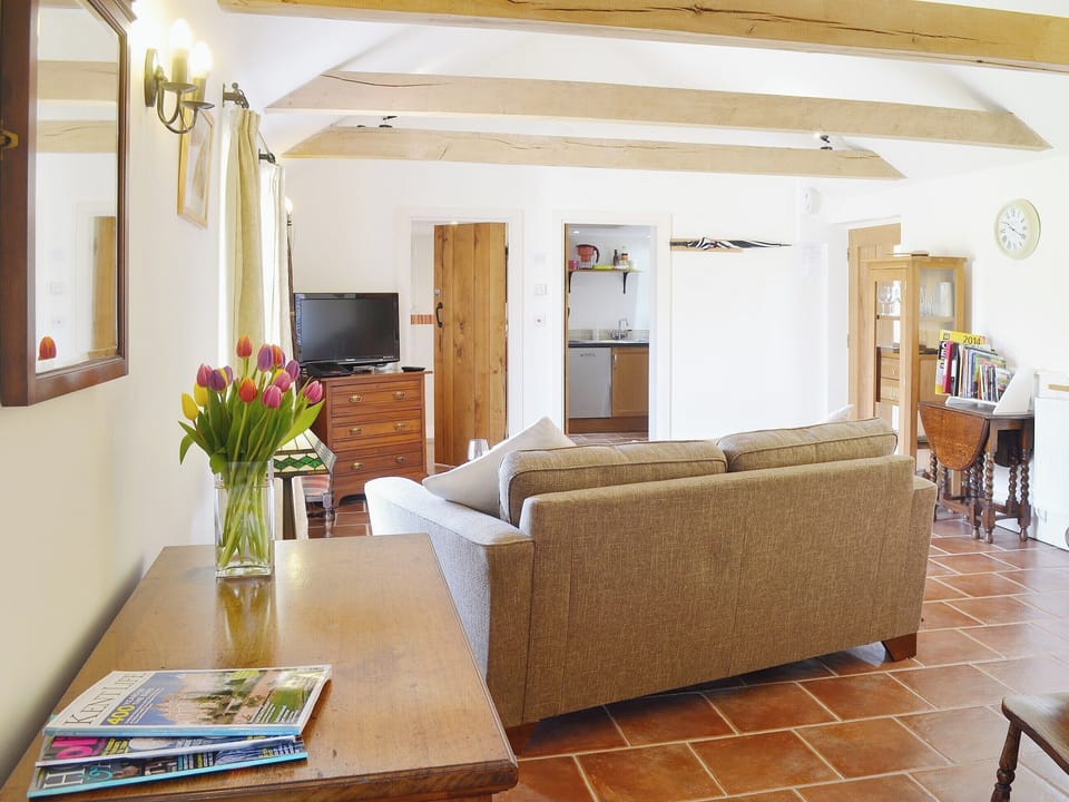Comfortable furnishings and contemporary decor sit alongside period features | The Stables - Canterbury Cottages, Shatterling, near Canterbury 