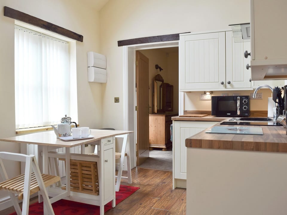 Charming kitchen/ dining area | The Smithy, Little Witley, near Worcestershire