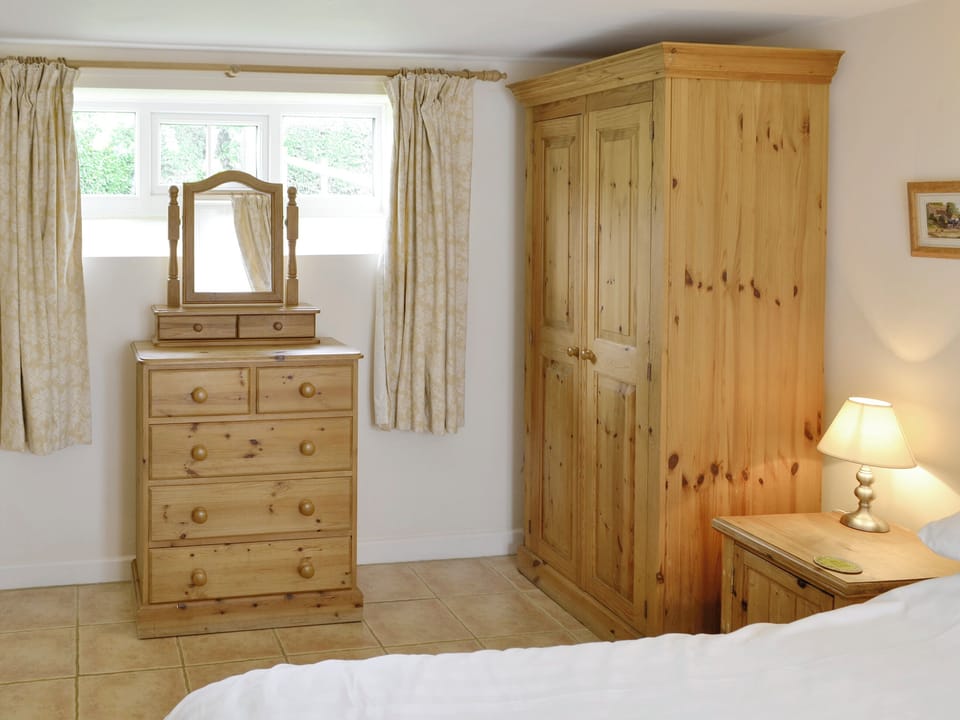 Ample storage within double bedroom | Wren Cottage, Salwayash, near Bridport