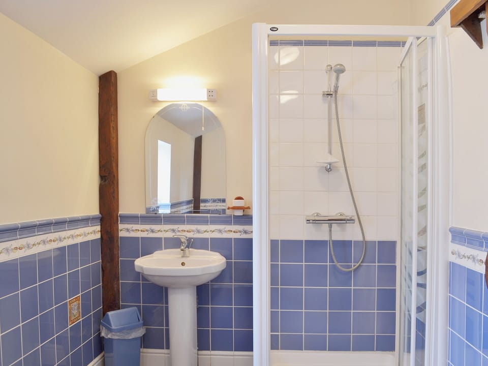 The twin bedroom also has exposed beams | Whitwell Farm CottagesAshley&rsquo;s, Whitwell Farm, Colyford, near Seaton