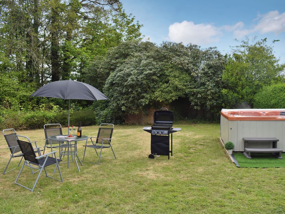 Hot tub | Cilwendeg Lodge, Boncath, near Cardigan