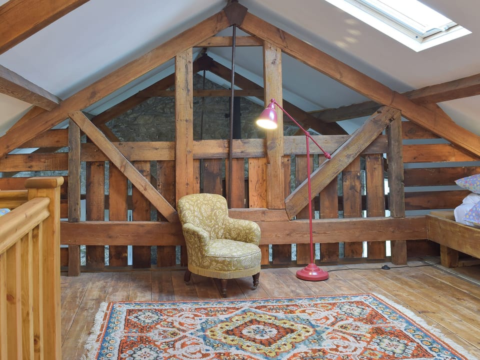 Mezzanine floor with twin beds | Ravens Roost - Upper Farm Barns, Mathry, near St Davids