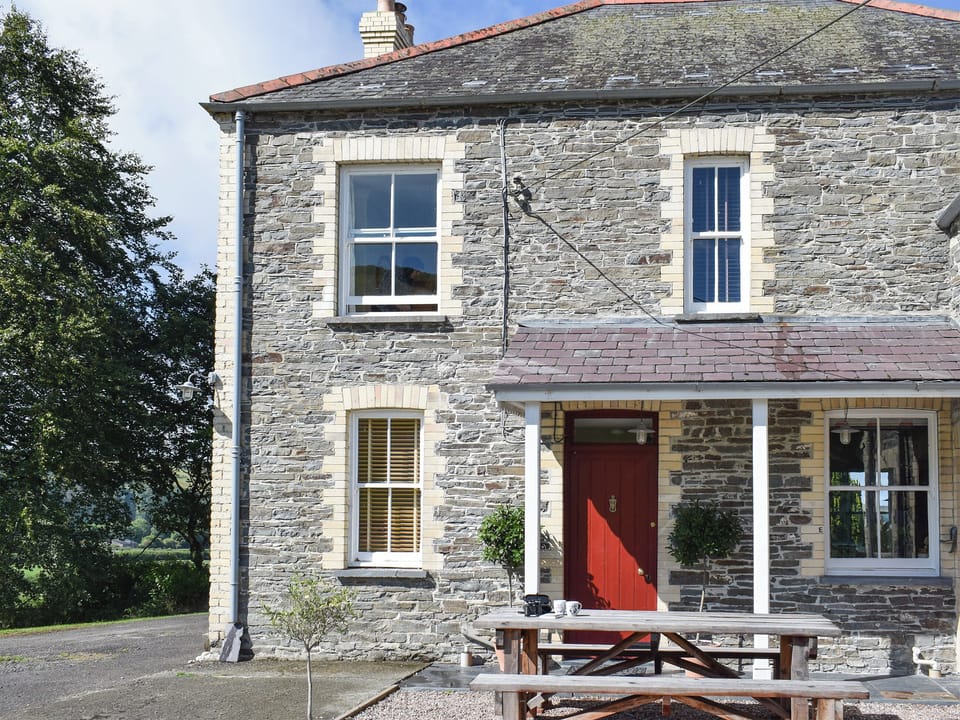 Patio at front of main entrance | Tyllwyd Farmhouse, Capel Bangor, near Aberystwyth