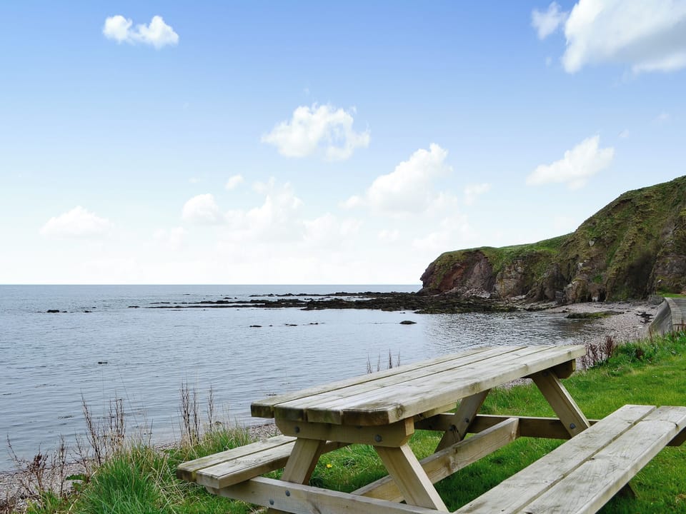Seating area with sea views | Archie&rsquo;s Cottage, Burnmouth, near Eyemouth