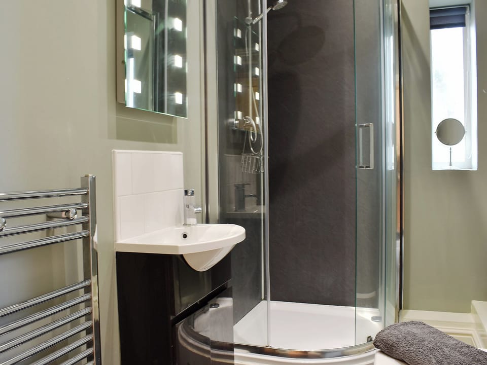 Shower room with shower cubicle, toilet and heated towel rail | Sycamore Cottage, Consett