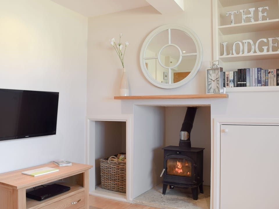 Cosy wood burner | The Lodge at Elmley Meadow, Elmley Castle, near Pershore