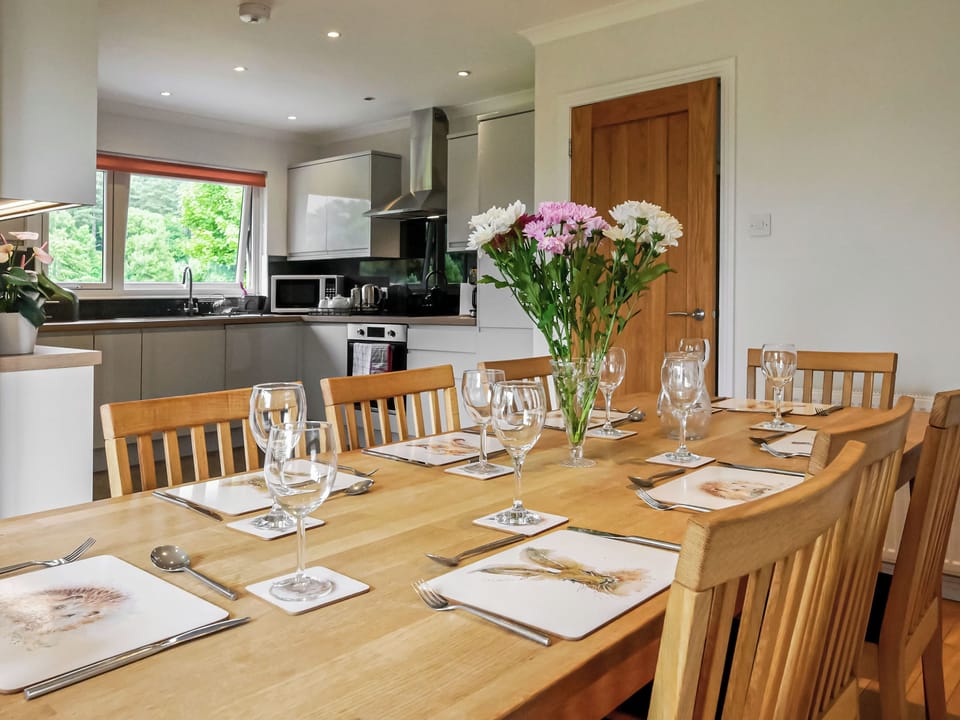 Intimate dining area within kitchen and adjoining utility room | Lapwing Rise, Banavie, near Fort William