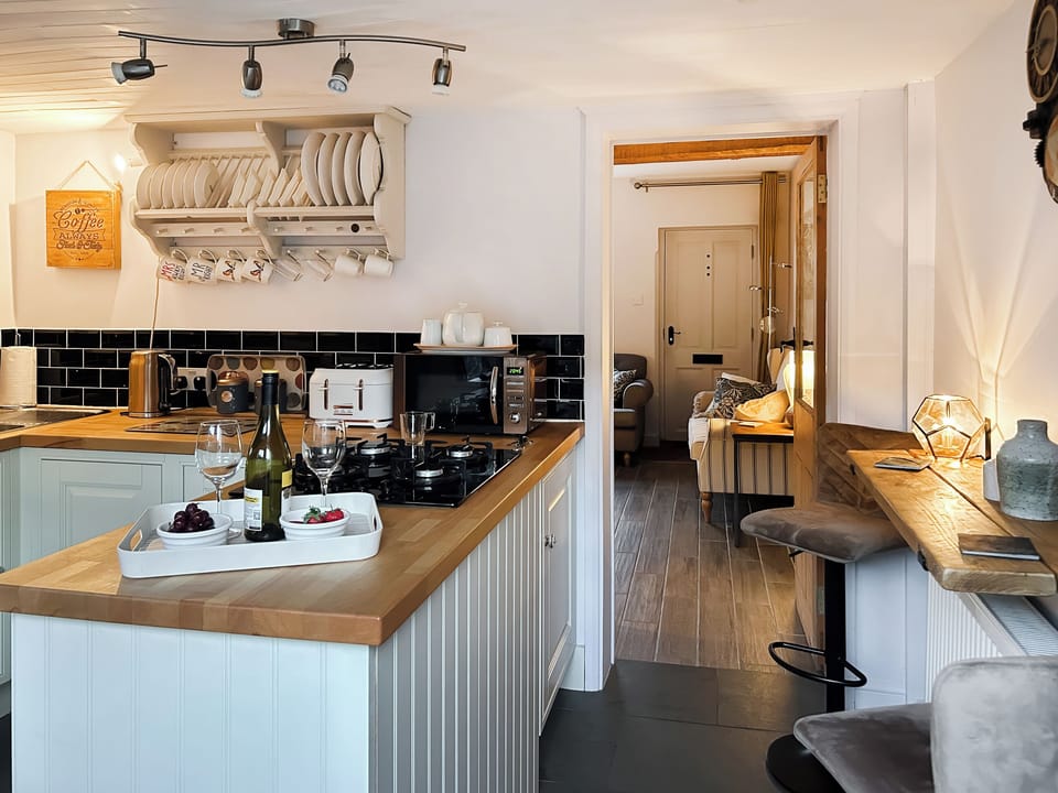 Warm and welcoming living room with wood burner | Time Cottage, Coltishall, near Wroxham