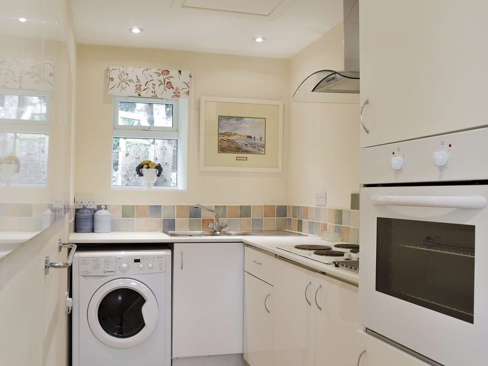 Well-equipped fitted kitchen | Stable Cottage, Gunville, near Newport