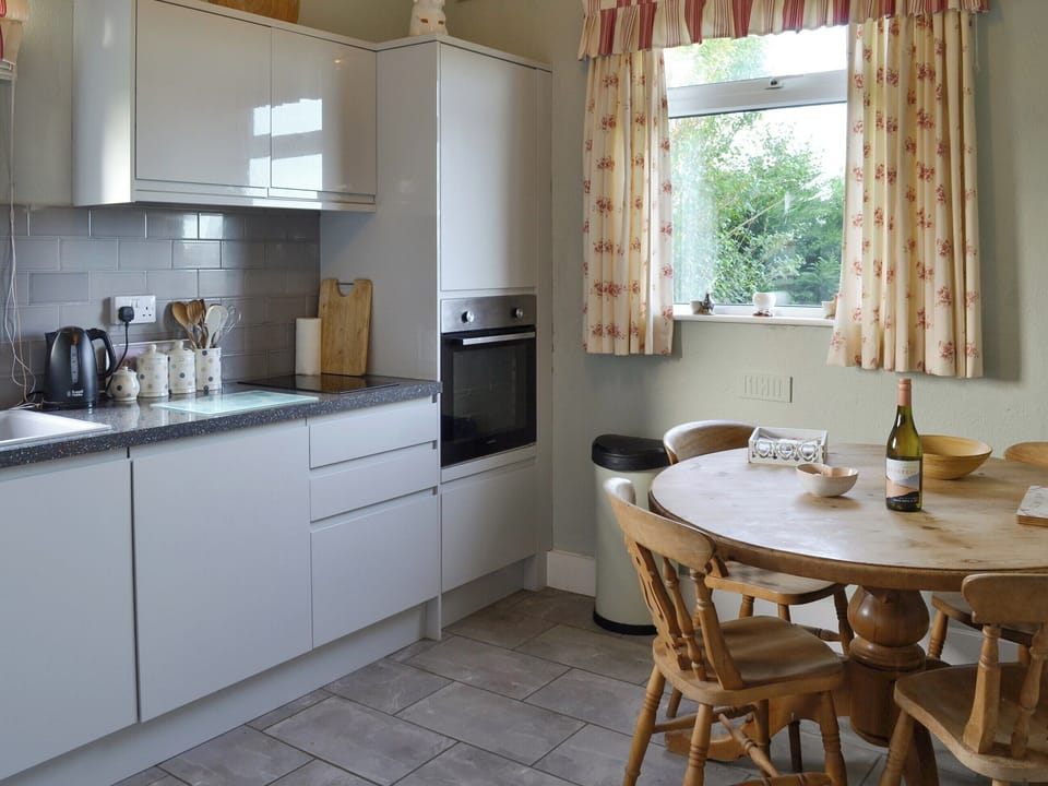 Well-equipped kitchen with dining area | Searchlight Cottage, Fraisthorpe, near Bridlington