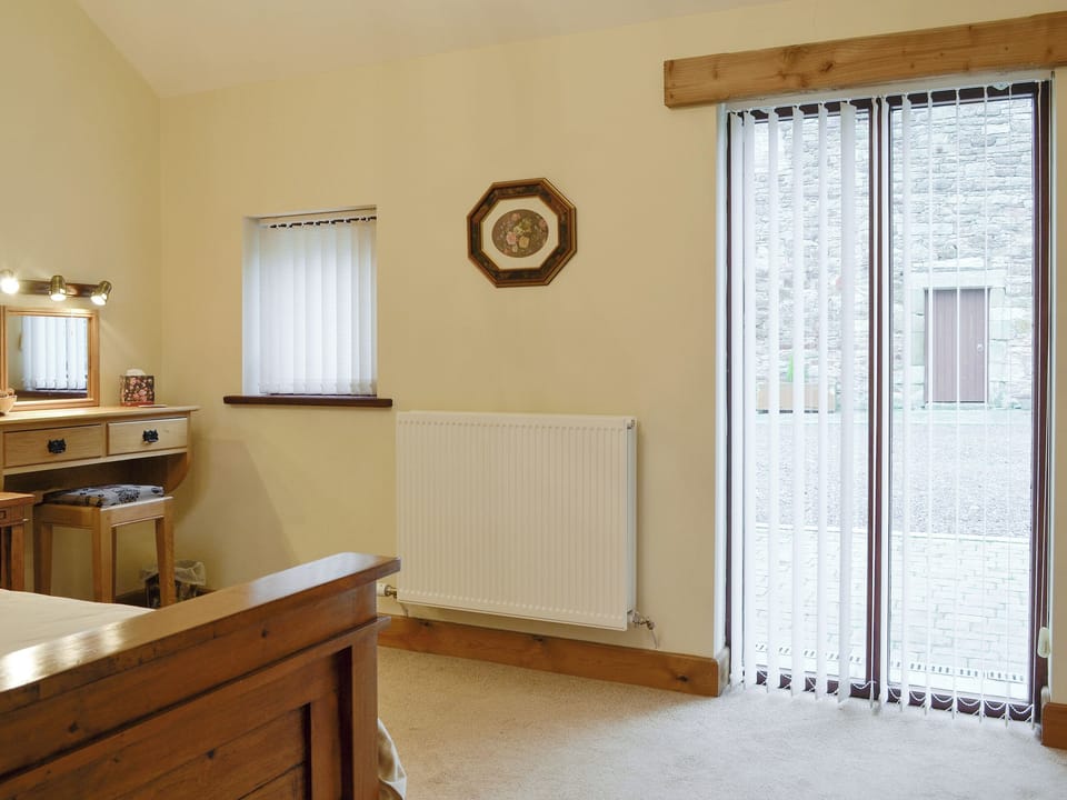 Spacious double bedroom | The Old Byre - West House Farm, Dearham, near Maryport