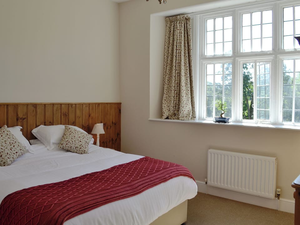 Comfortable double bedroom | The Farmhouse - Round Chimneys Farm, Glanvilles Wootton, near Sherborne