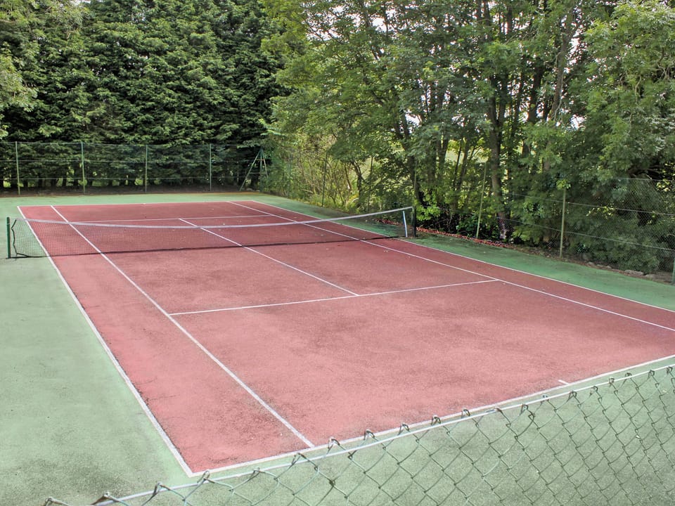 Tennis court | Fochy Cottage - Waulkmill Cottages, Kinross, near Perth