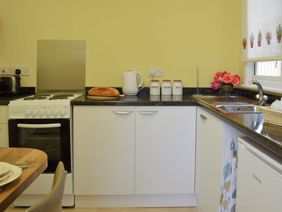 Kitchen with dining area | The Cabin, Pevensey Bay, near Eastbourne