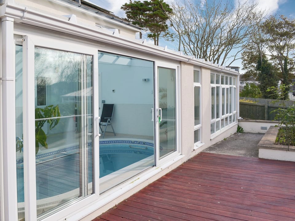 Rear with pool area | Riverside, Bude