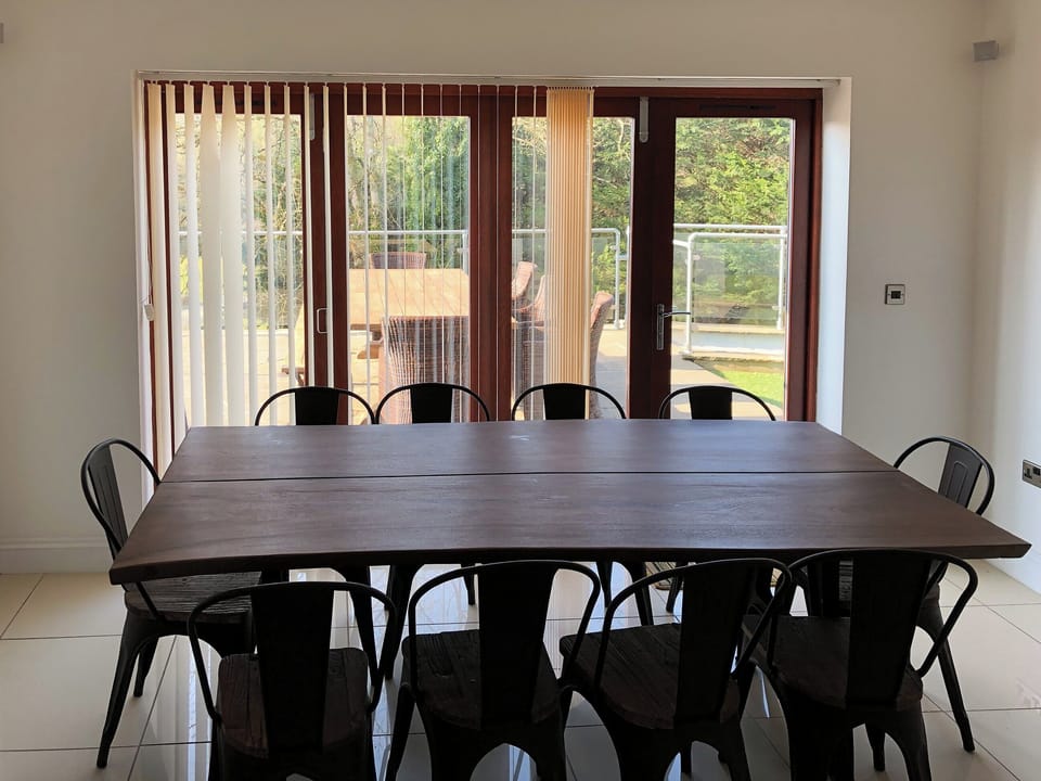 Large dining area with bi-fold doors | Hafan Dawel, Stepaside, near Saundersfoot