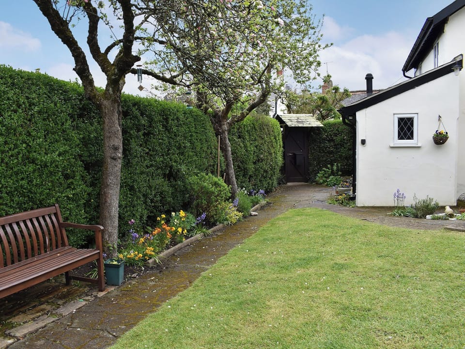 Delightful garden with bench seating | Apple Tree Cottage, Charmouth