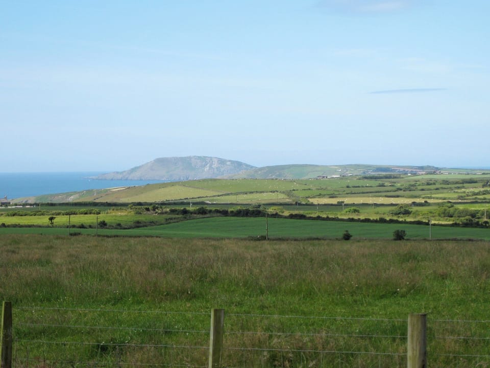 View from garden looking across the fields to Bardsey Island near Aberardon | Salfur, Rhiw, near Pwllheli