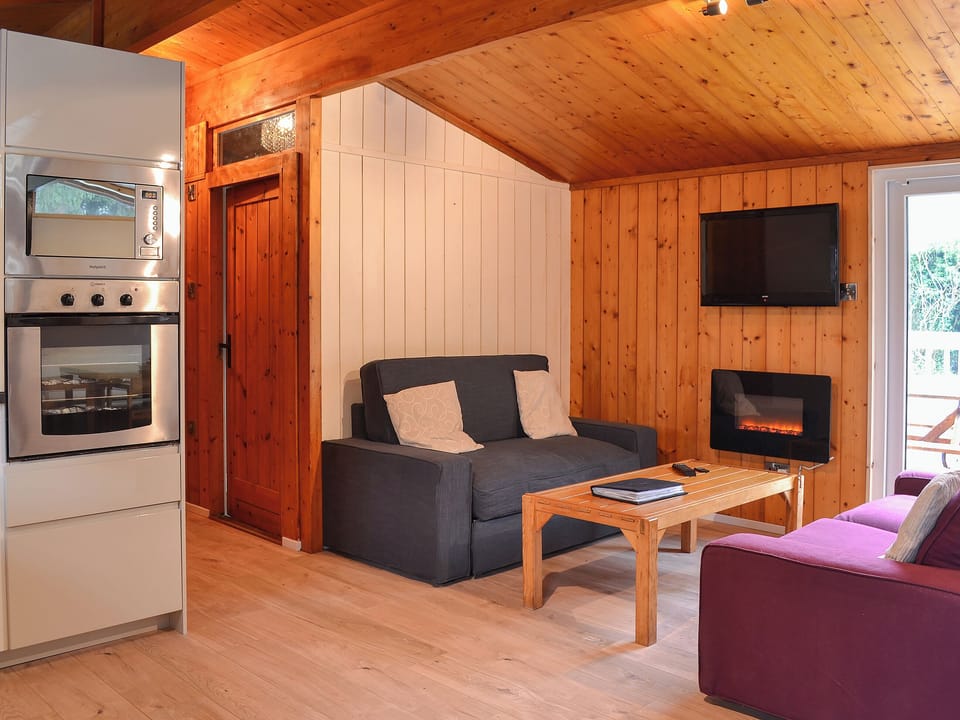 Cosy and warm living area | Cedar Lodge, Charlcot, near Masham