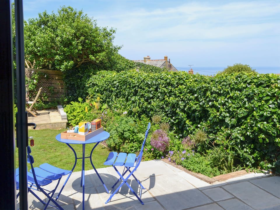 Sitting-out area with garden furniture, BBQ and lovely sea views | Bosun&rsquo;s, Port Isaac, near Wadebridge