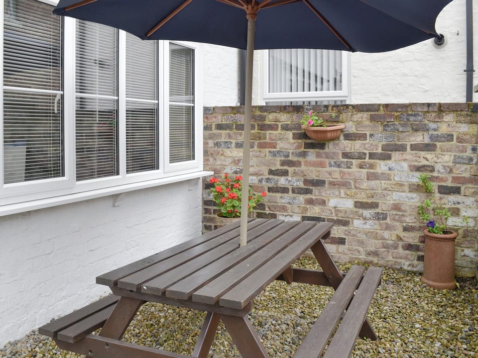 Patio area with outdoor furniture | Mews Cottage, Bridlington