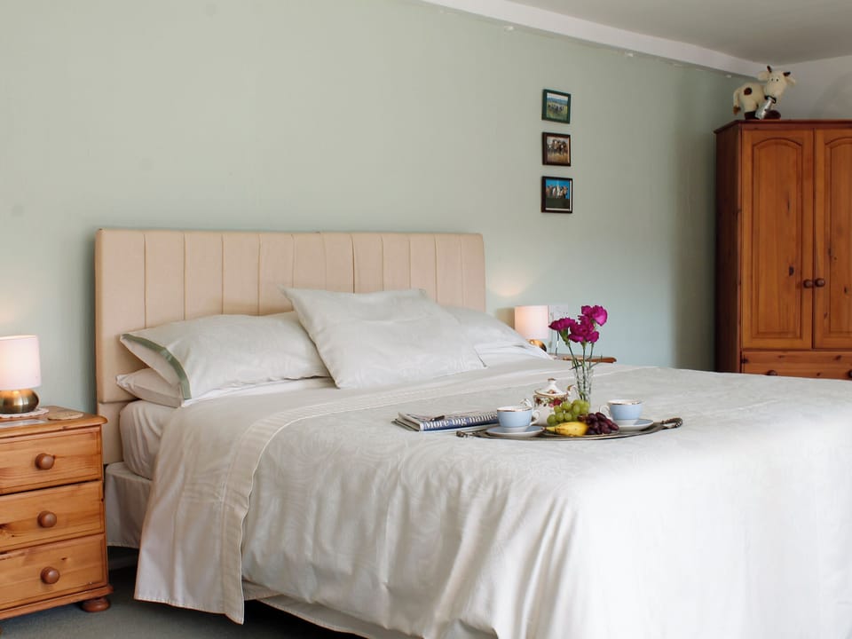 Double bed within family bedroom | Dairy Cottage, Barnstaple
