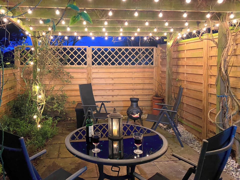Sitting-out-area | Coachman&rsquo;s Cottage - Old Downs Farm, Sandwich Bay, near Sandwich