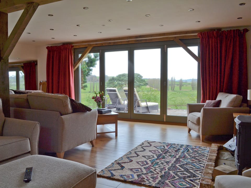 Living space with bi-folding doors | Henry Oscar House, Winchelsea, near Rye