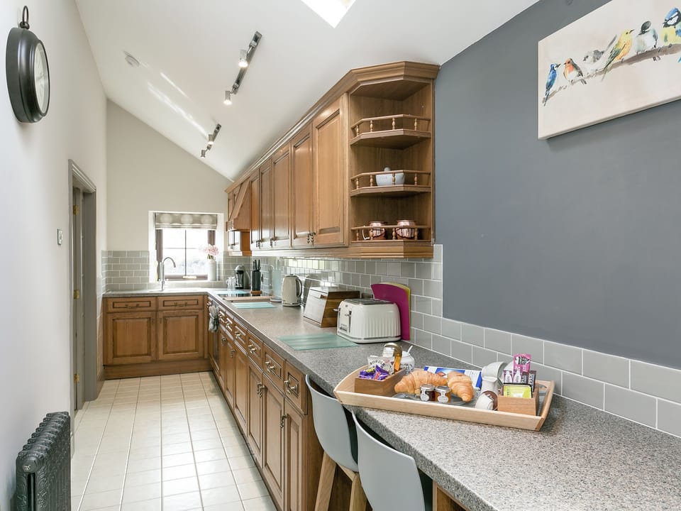 Well equipped galley style kitchen | The Old Church, Alton, near Chesterfield