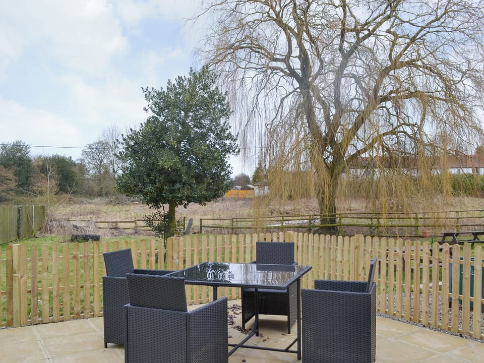 Enclosed patio area with outdoor furniture | No. 1 Ash Cottage - Six Ash Cottages, Six Ashes, near Bridgnorth
