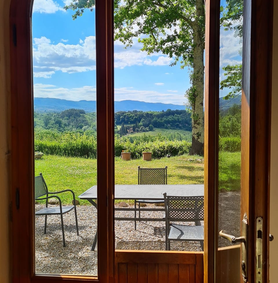 Doorway from the sitting room to Casa Colonica garden (view over the Valdarno).