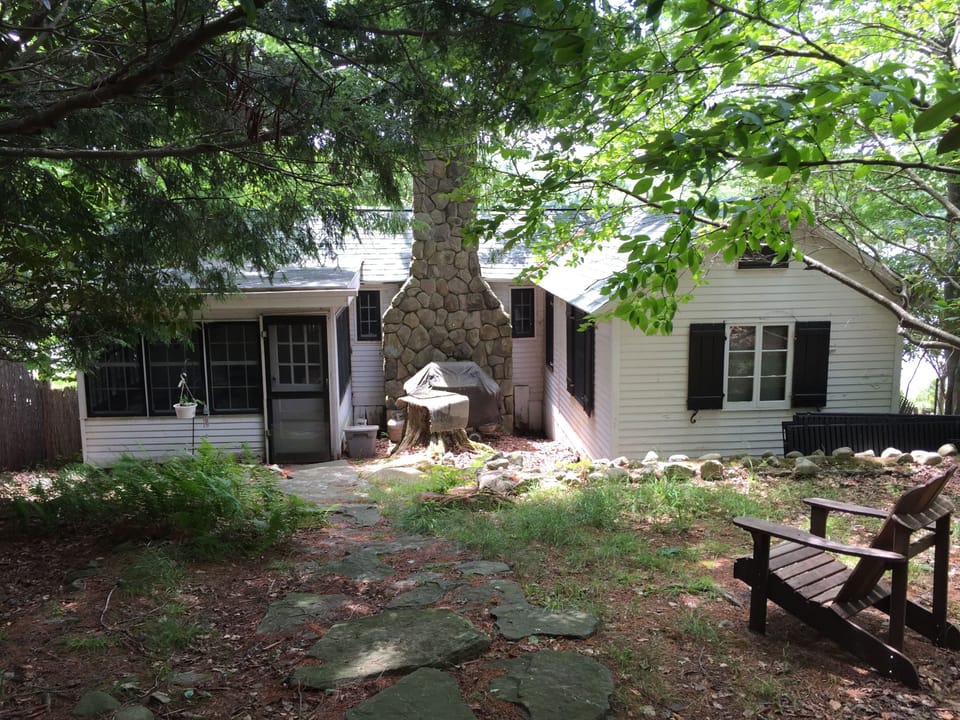 Back yard with partial view of lake
