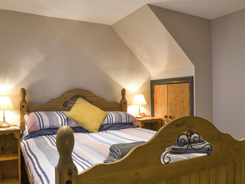 Relaxing double bedroom | The Stables - Tyddyn Iolyn, near Criccieth