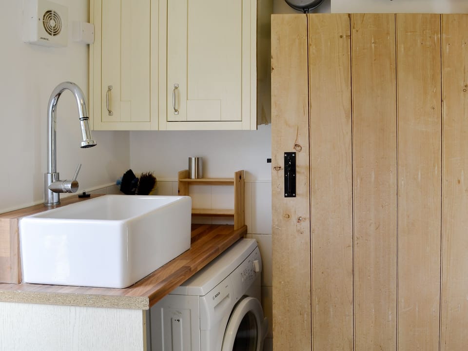 Useful utility room | Bryn Gwnog, Llanrwst, near Betws-y-Coed
