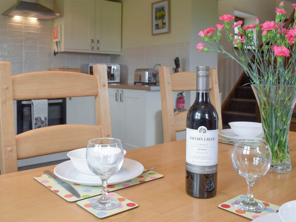 Convenient dining area within kitchen | Bryncrwn Cottage, Llanfarian, Aberystwyth
