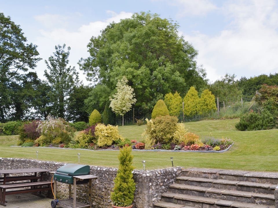 Patio and gardens | Henwood, Stable Cottage, Shepherds Den - Drayton Farm Barns, East Meon, Petersfield