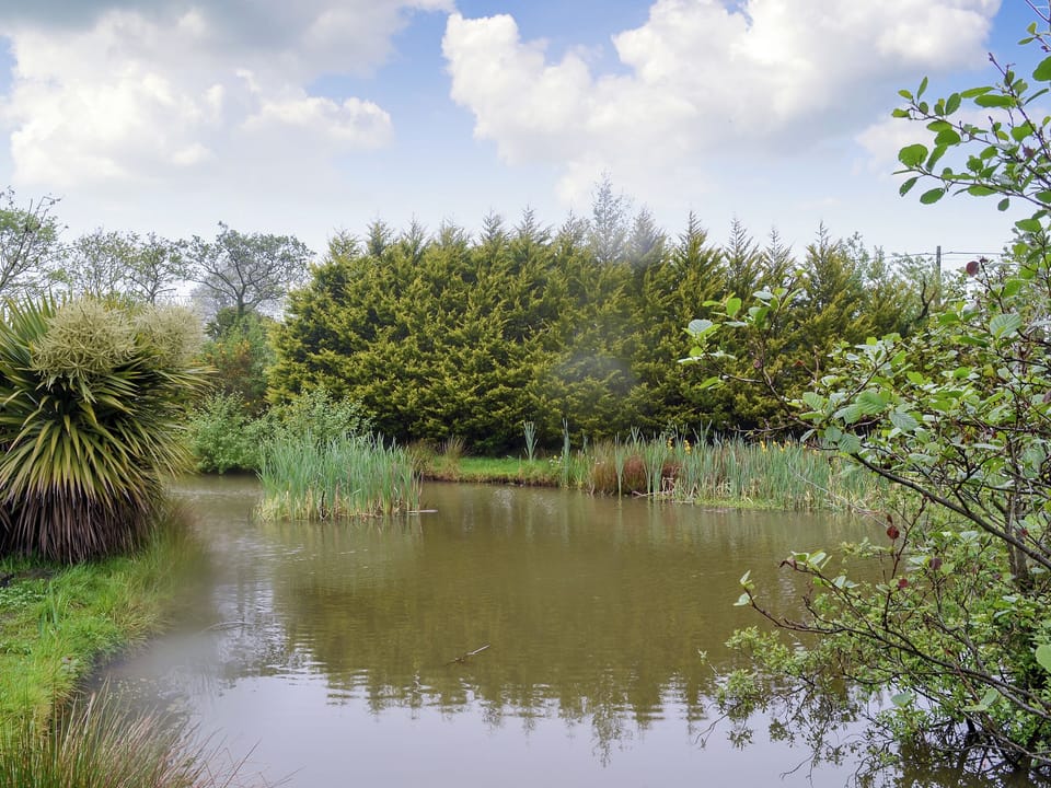 Small fishing lake | Hunter&rsquo;s Cottage - Llwyn Ffynnon, Y Ff&ocirc;r, near Pwllheli
