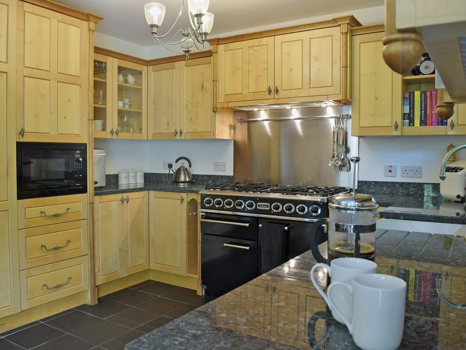 Beautifully presented kitchen/dining room with patio doors leading to garden | Cornant, Llechryd, near Cardigan