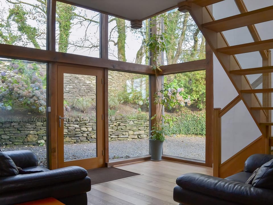 Light and airy entrance hallway with imposing staircase | Polmear Barn, Tregoodwell, Camelford