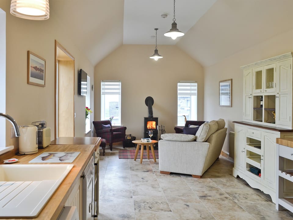 Kitchen and living room | Kilbride Beach Cottage, near Lochboisdale, Isle of South Uist